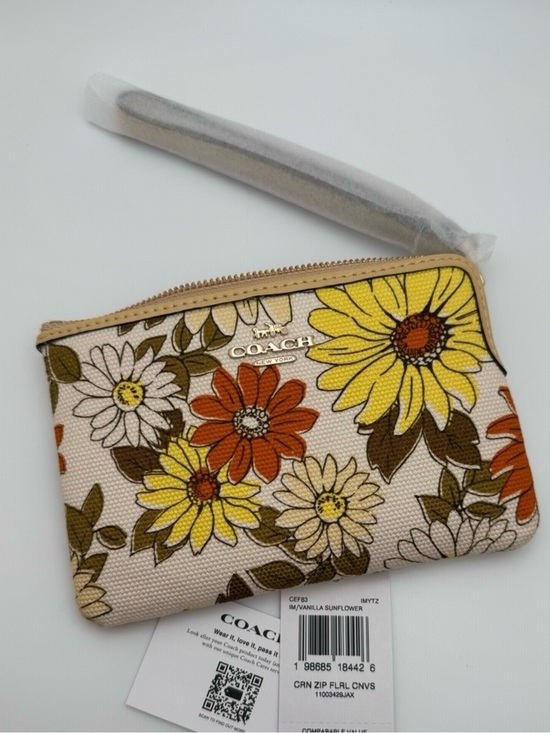 Coach Handbags - NWT Coach CEF83 Vanilla Sunflower Floral Print Corner Zip Wristlet